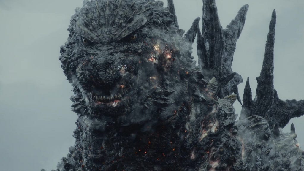 Screenshot of Godzilla showing slight burns on its face and body.