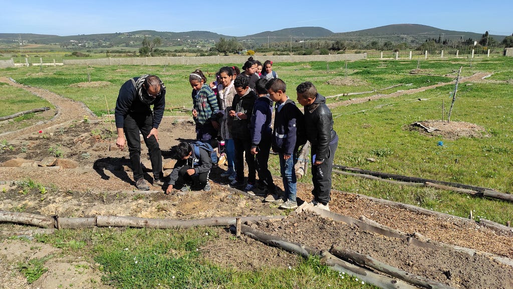 Elyes Mkacher teaching about permaculture and soil regeneration