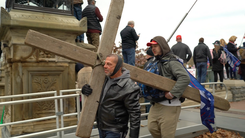 Man holding the Jericho cross