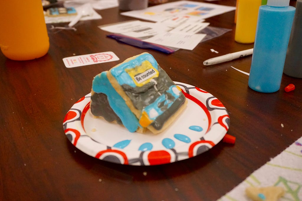 Cookie depicting a bus in a sink hole