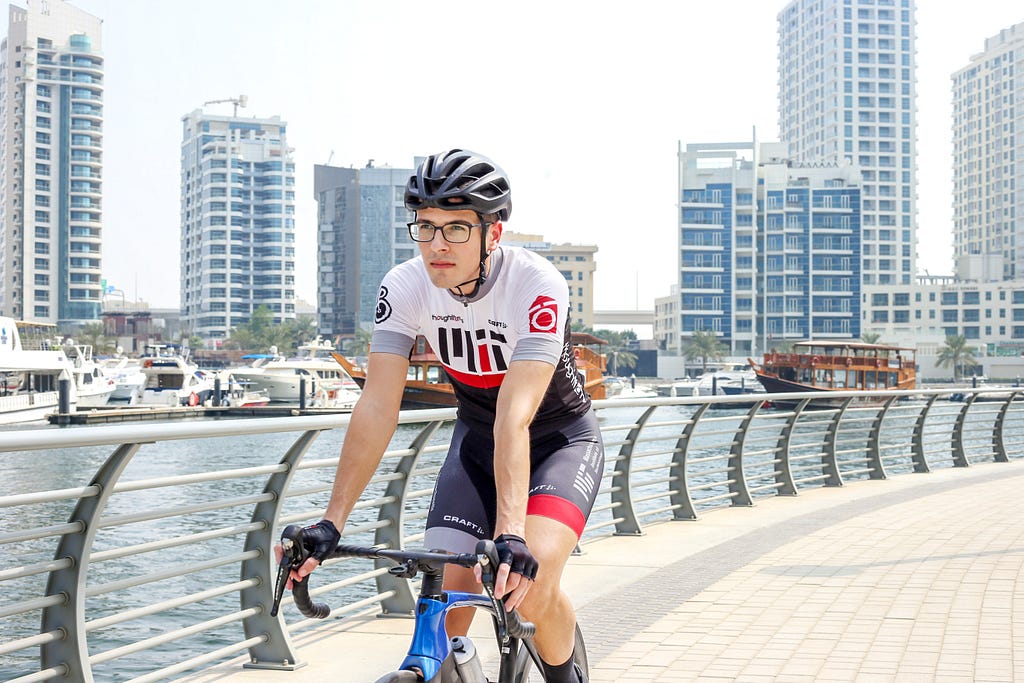 Amir in cycling gear in Dubai Marina