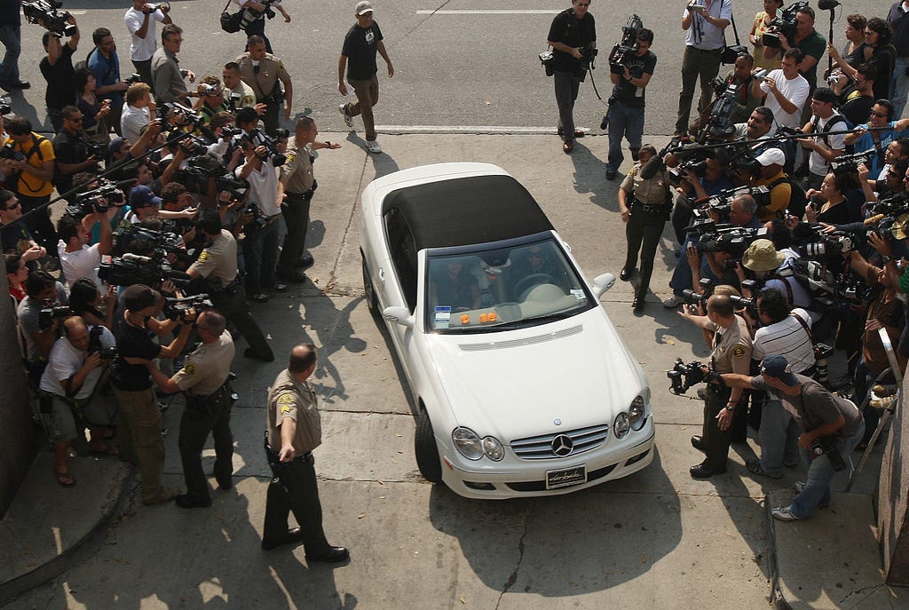 Britney Spears drives past photographers before appearing in family court in Los Angeles in 2007.