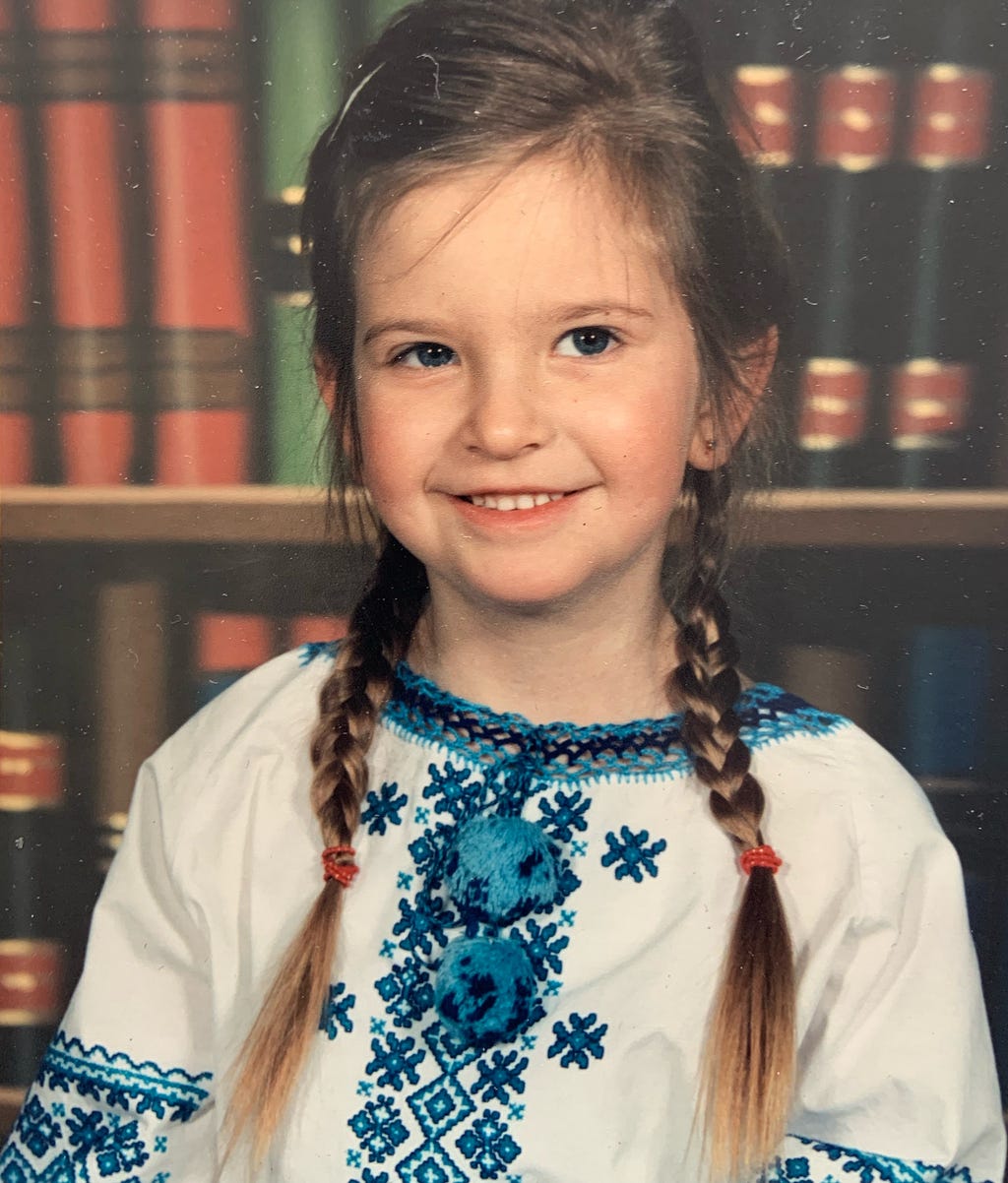 A young Danya wearing a traditional Ukrainian blouse