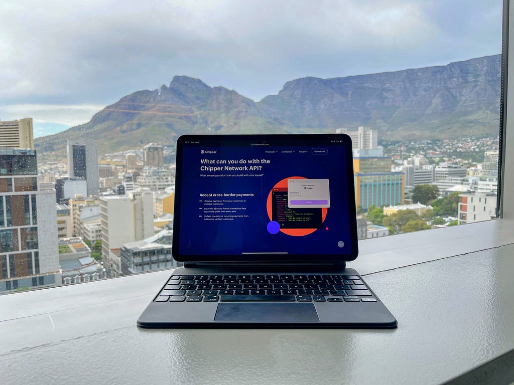 Picture of an iPad with a background of Cape Town table mountains