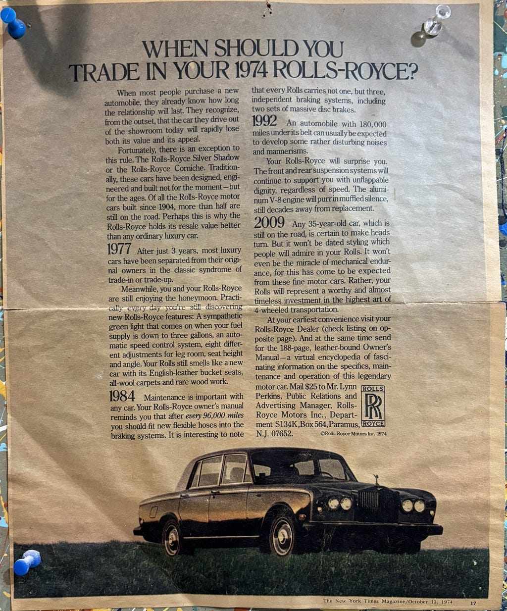 Photo of a magazine ad for a Rolls Royce, showing mostly text and a photo of a Rolls. See document for full text.