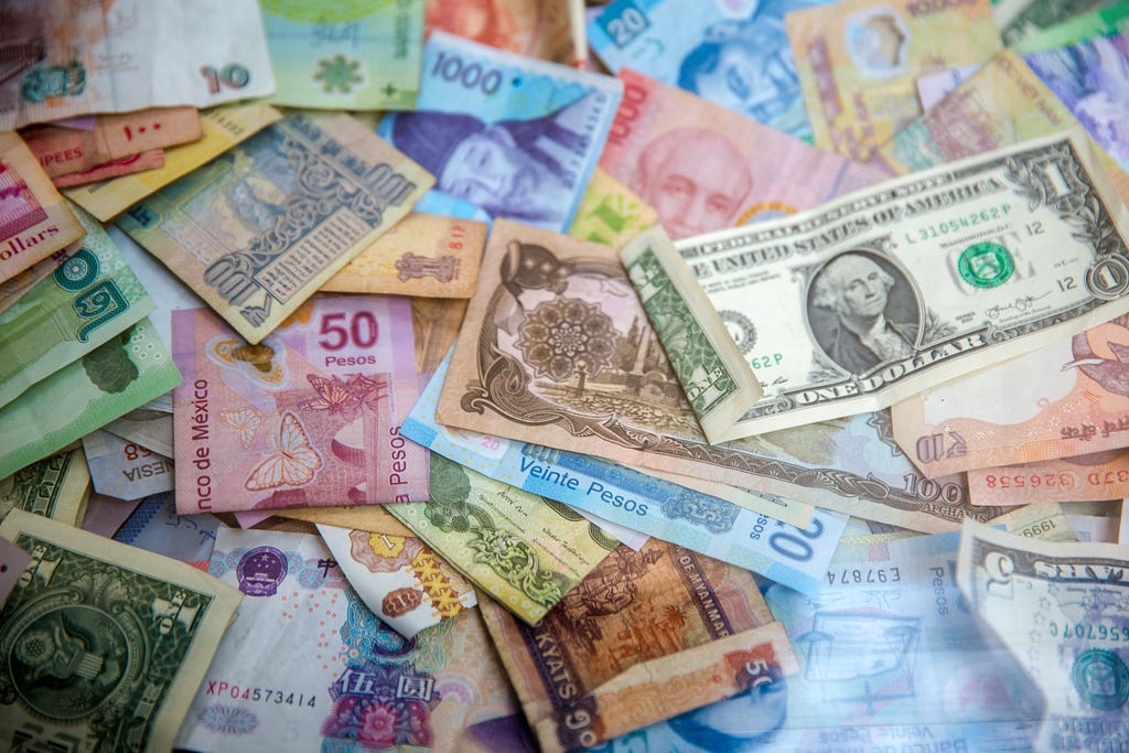 A collection of single bill currencies from countries all over the world.