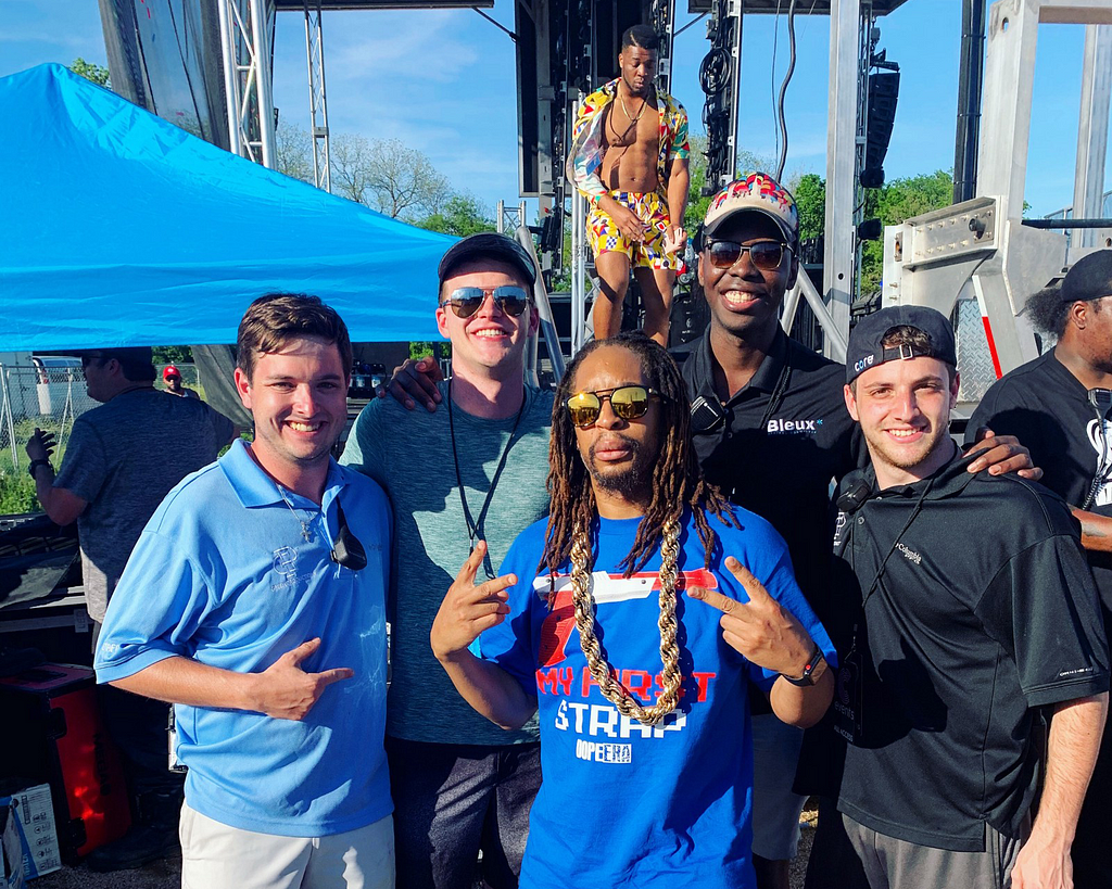 Umar Brimah and the Bleux Team posing with Lil Jon after Bleux Fest