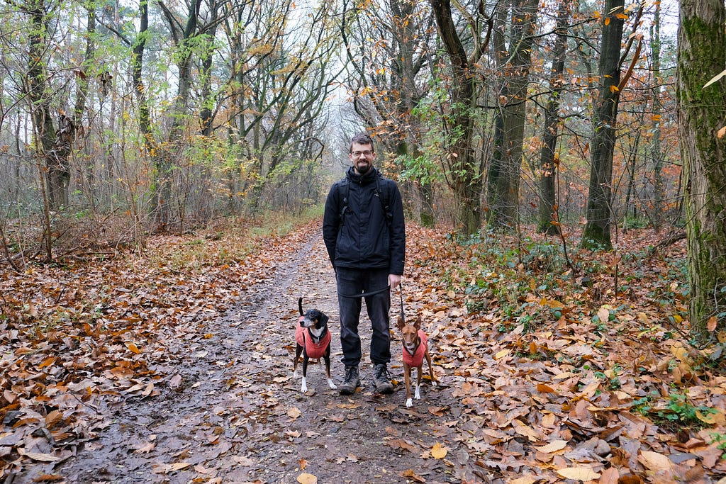 Photo of Josip on a walk with his two dogs