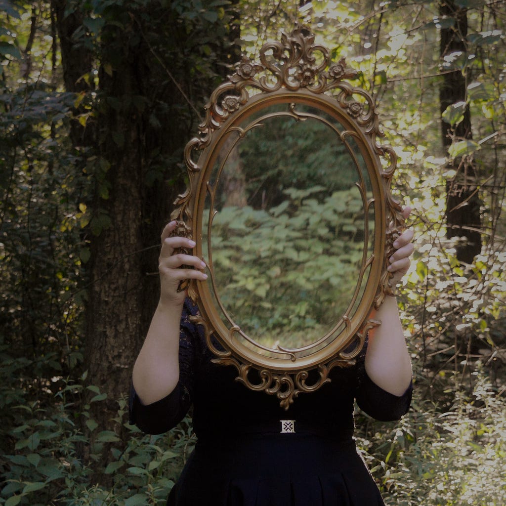 Woman Holding Mirror, Female Body Image — Photo by Tasha Kamrowski