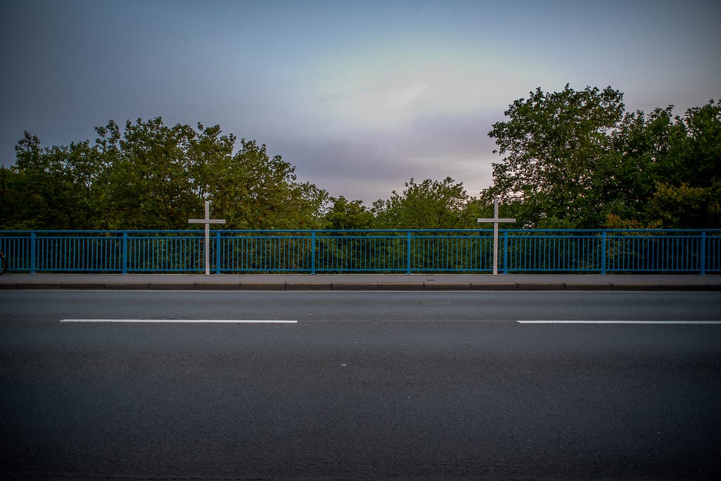 Earlier this summer, the french steel fabricator Vallourec decided to close its facilities in Mülheim. In protest, employees have installed white wooden crosses along the sidewalks that enclose the factory site. Mülheim a. d. Ruhr, Germany, August 17, 2022.