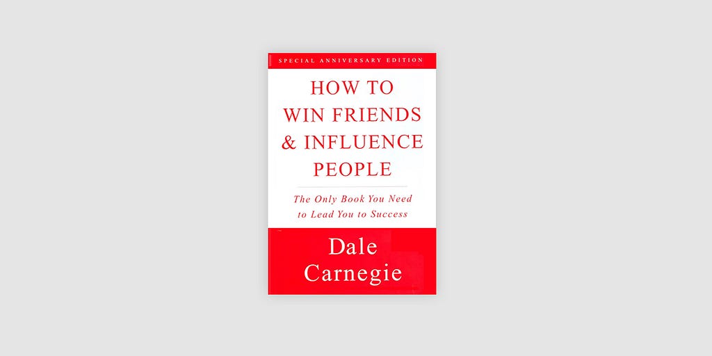 Red & White Book Cover of Dale Carnegie’s ‘How to Win friends and influence people”