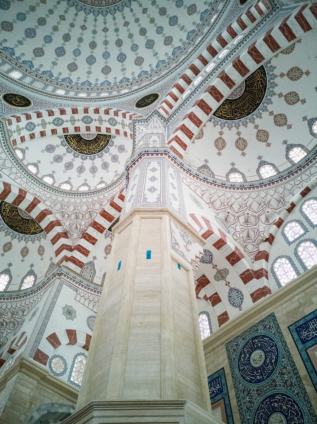 Note the rondels both on the ceiling and the walls in this mosque in Turkey. Photo by Engin Akyurt from Pexels