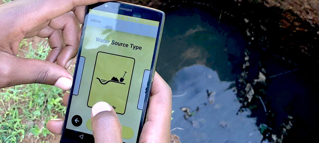 A member of the community reporting water bodies in African cities using the Zzapp Malaria mobile app