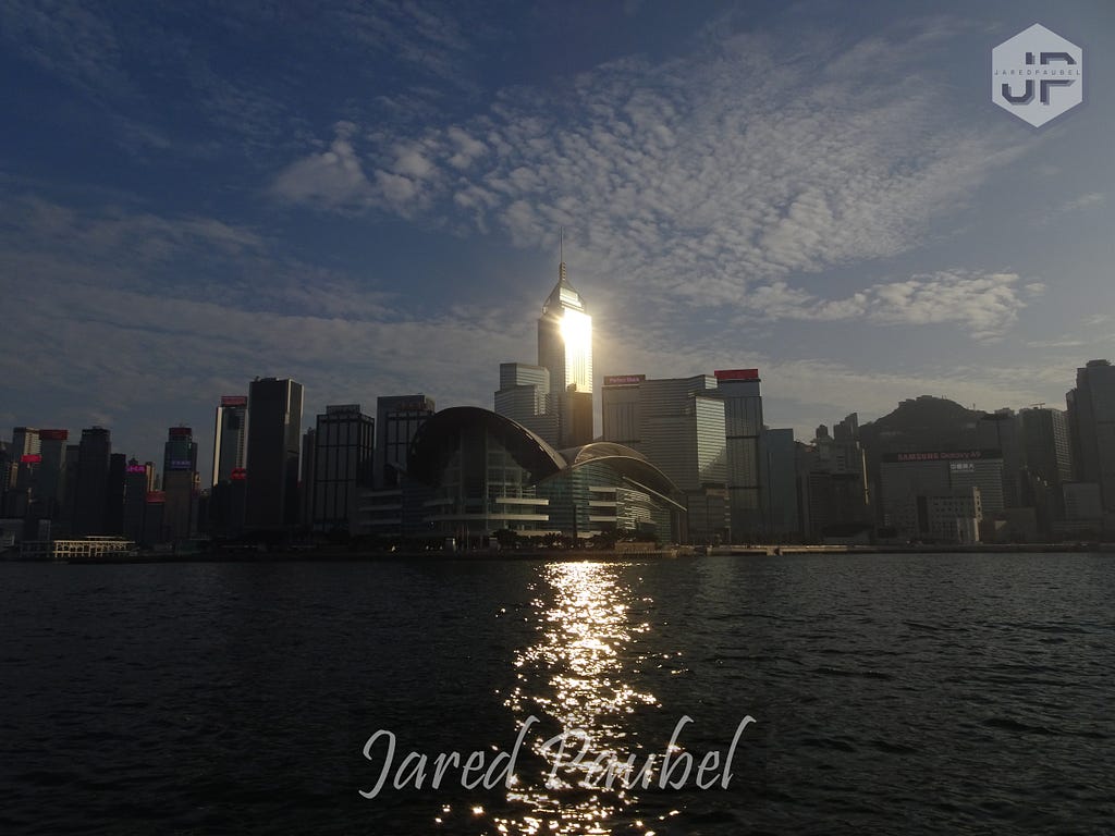 Skyline of Hong Kong glistening in the sunlight.