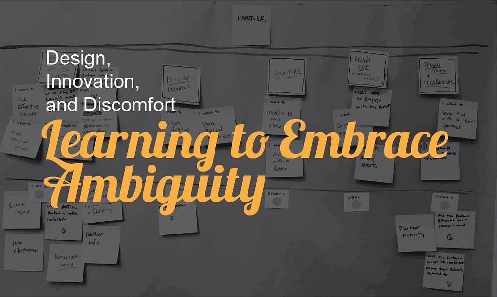 The article title “Learning to Embrace Ambiguity” written in yellow on top of a darkened picture of post-it notes.