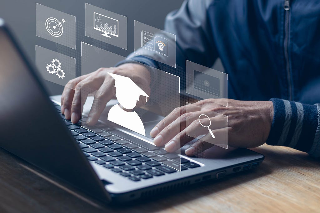 Photo of a person working on a laptop. Above the laptop are graphics of a person in a graduation cap, a magnifying glass, a book with checkmarks in it, a computer with a bar graph, a target with a bullseye, and gears.