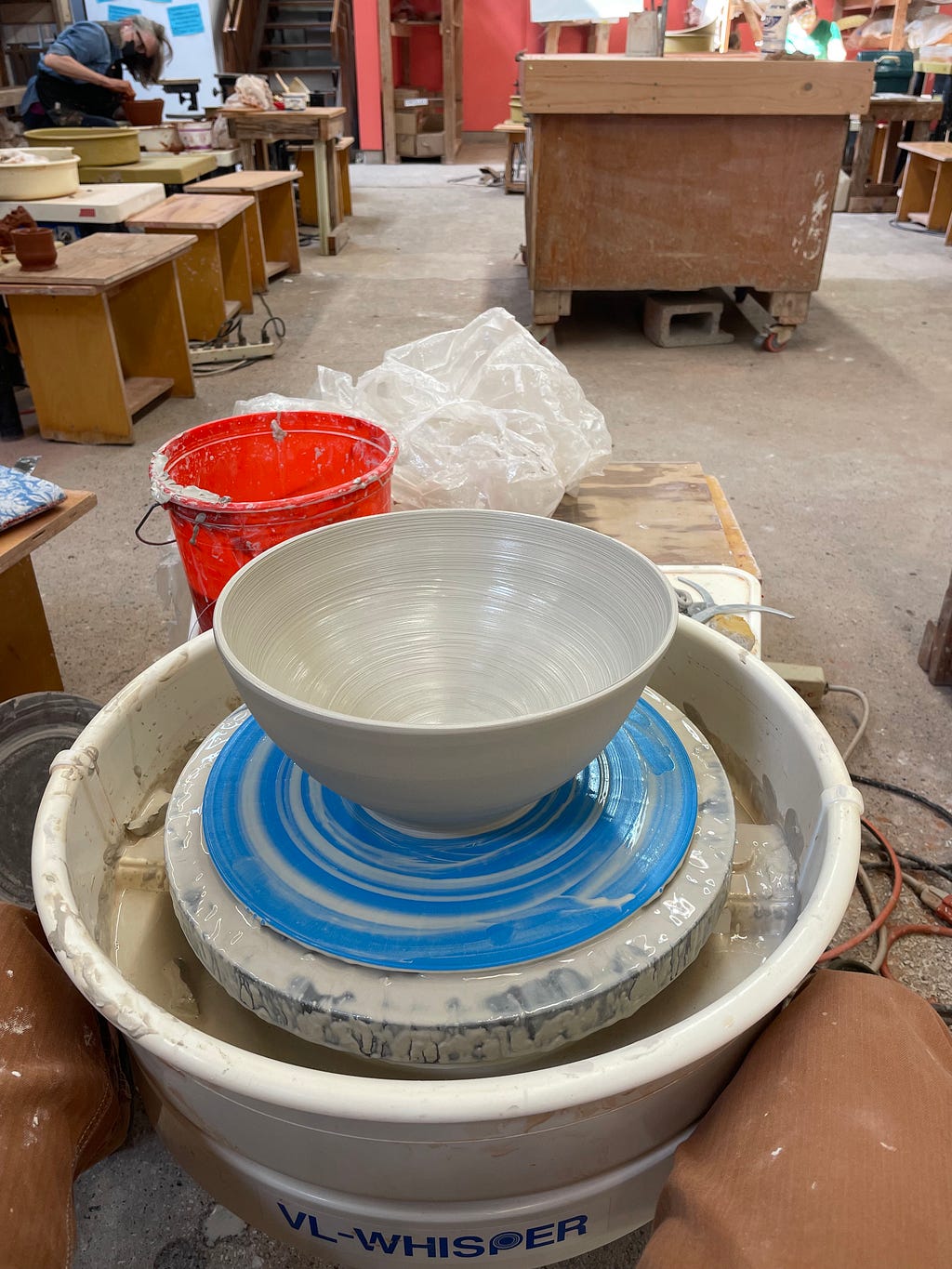 A wheel thrown bowl on the wheel