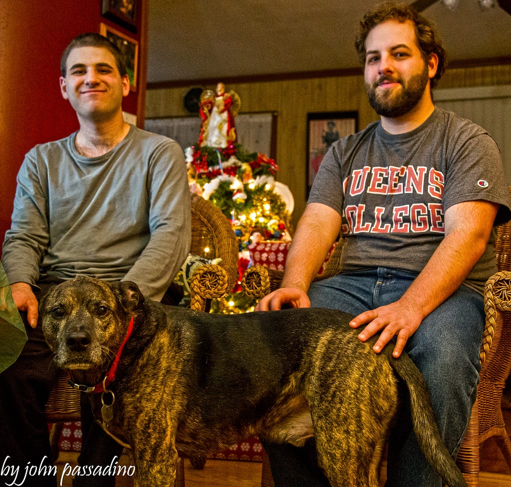 My two grown sons sitting next to Carter.