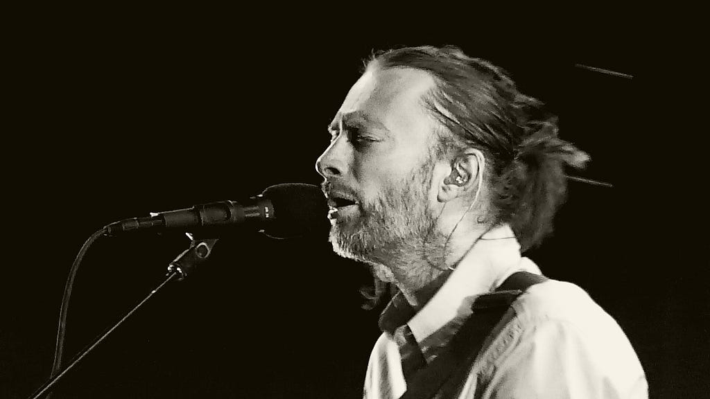 Thom Yorke in concert with Radiohead. Nimes, 11 July 2012.