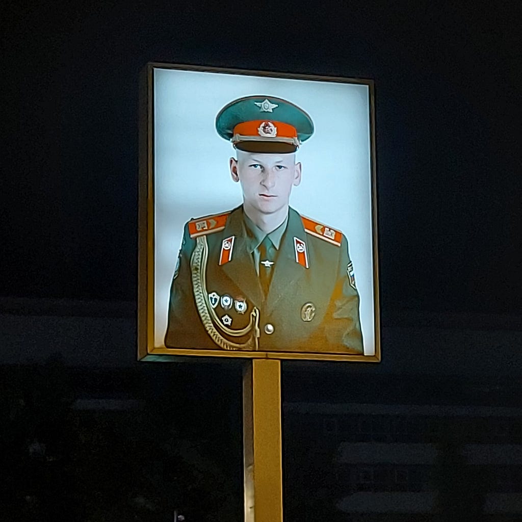 Sign depicting a Soviet soldier. located at checkpoint Charlie, Berlin.