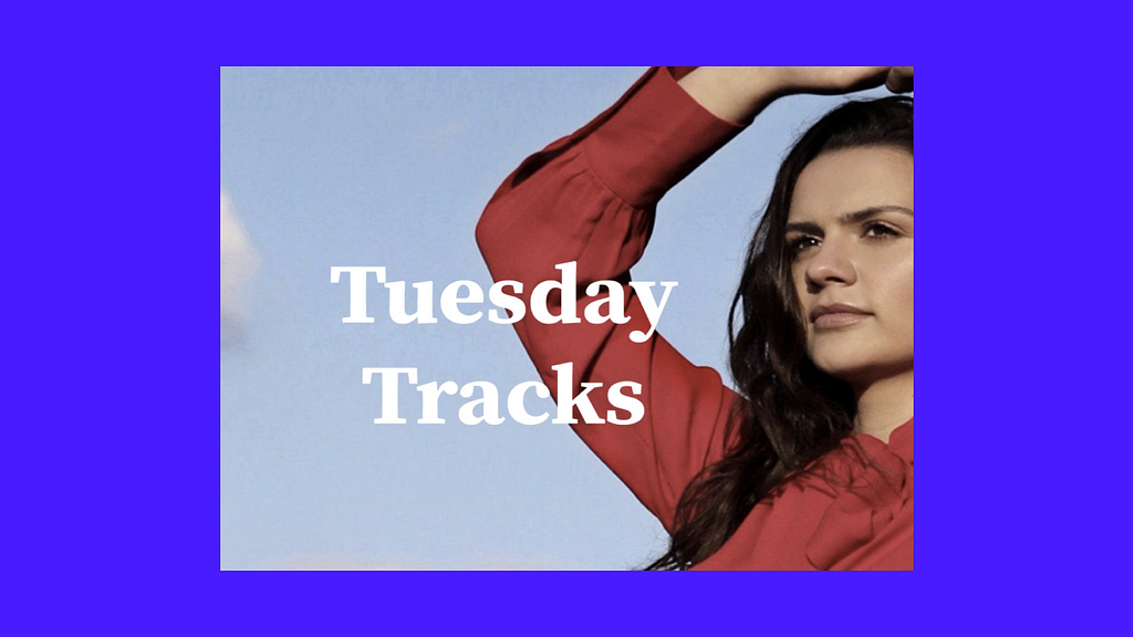 A picture of Sirena Maré against a blue sky with the text “Tuesday Tracks” collaged over a solid purple background.
