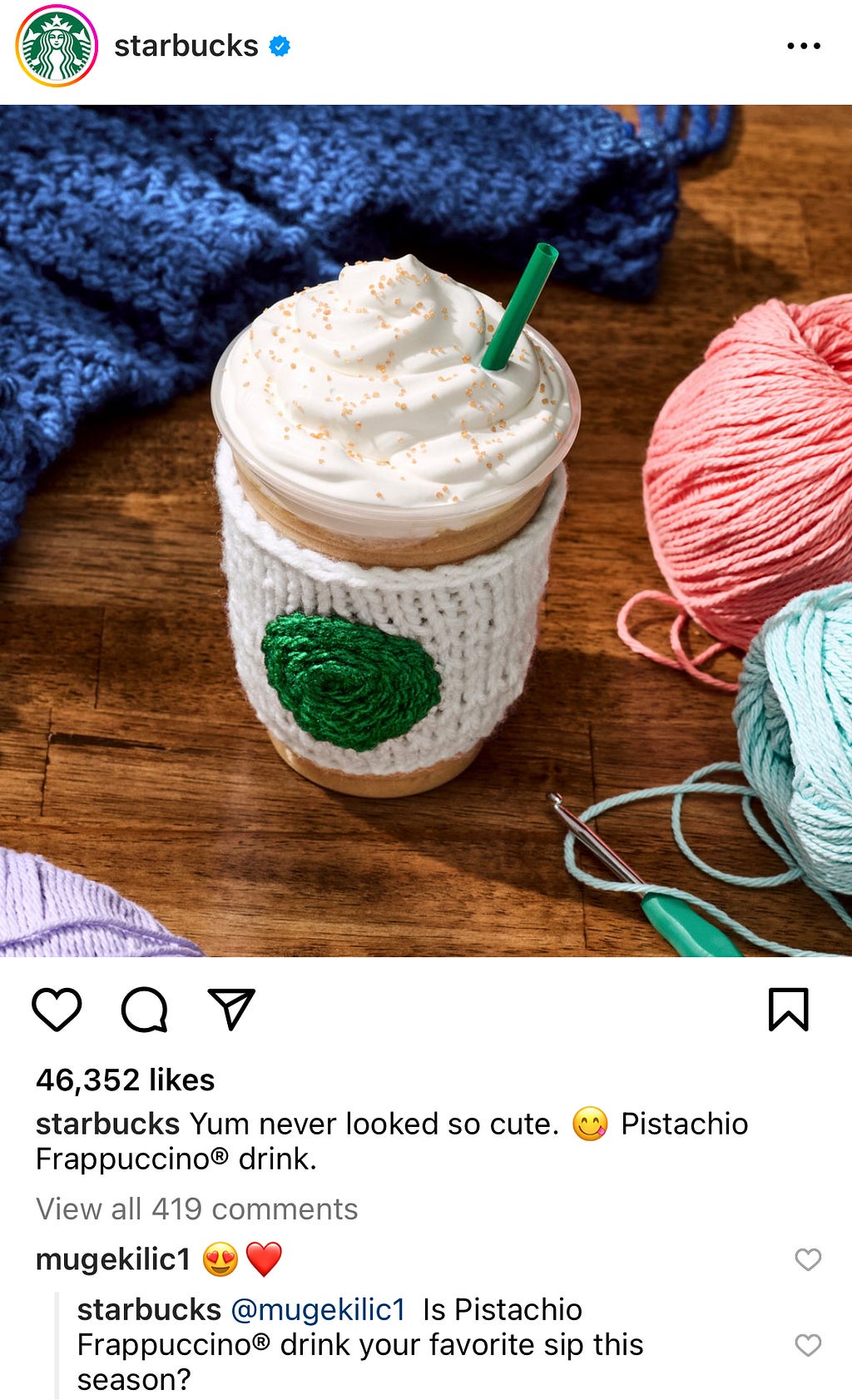 Screen capture of Starbucks Pistachio Frappucino in a white knitted cup koozie with a green circle, mimicking the Starbucks logo.