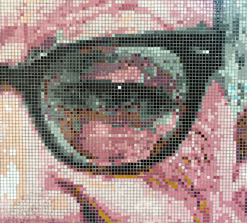 Mosaic of an old man’s eye and glasses