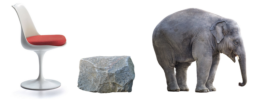 A chair, a rock and an elephant