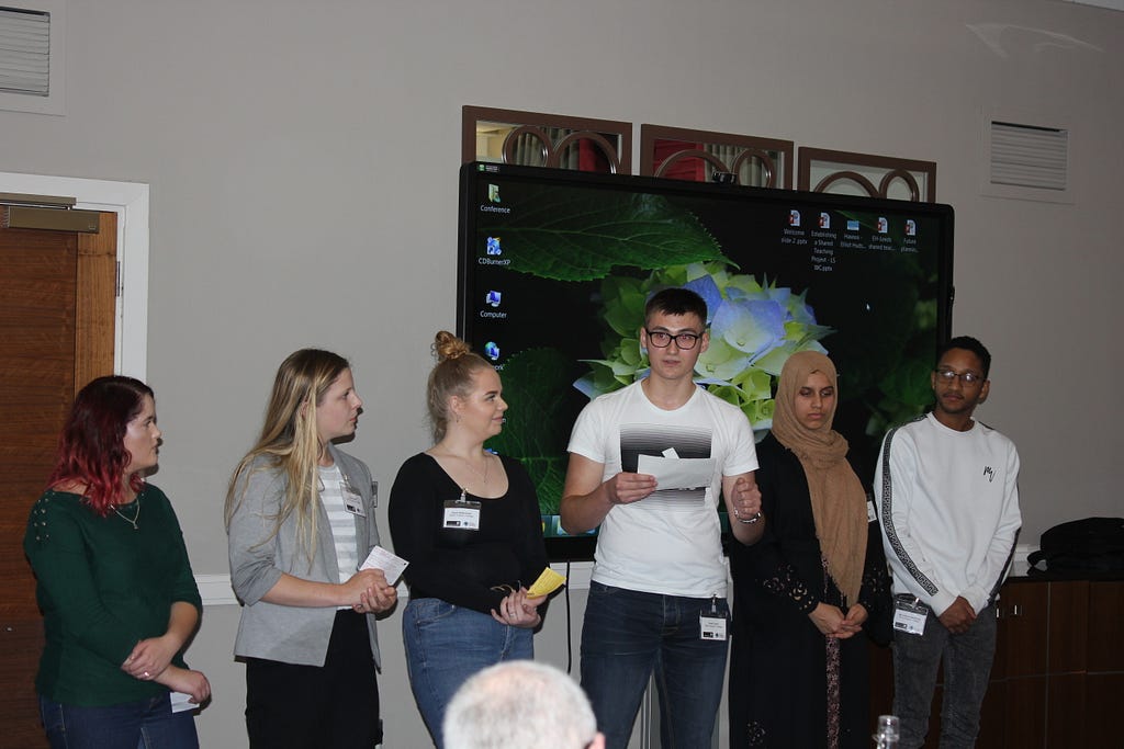 Students presenting at the event