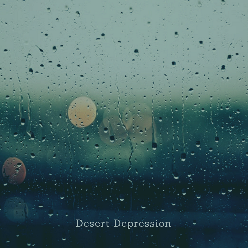 The image is from the perspective of someone looking out the window on a rainy day. At the bottom of the page is grey text: “Desert Depression”.