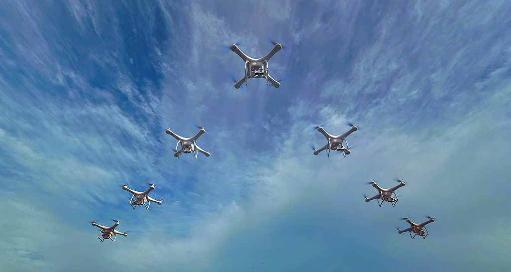 Photo of a formation drone swarm.