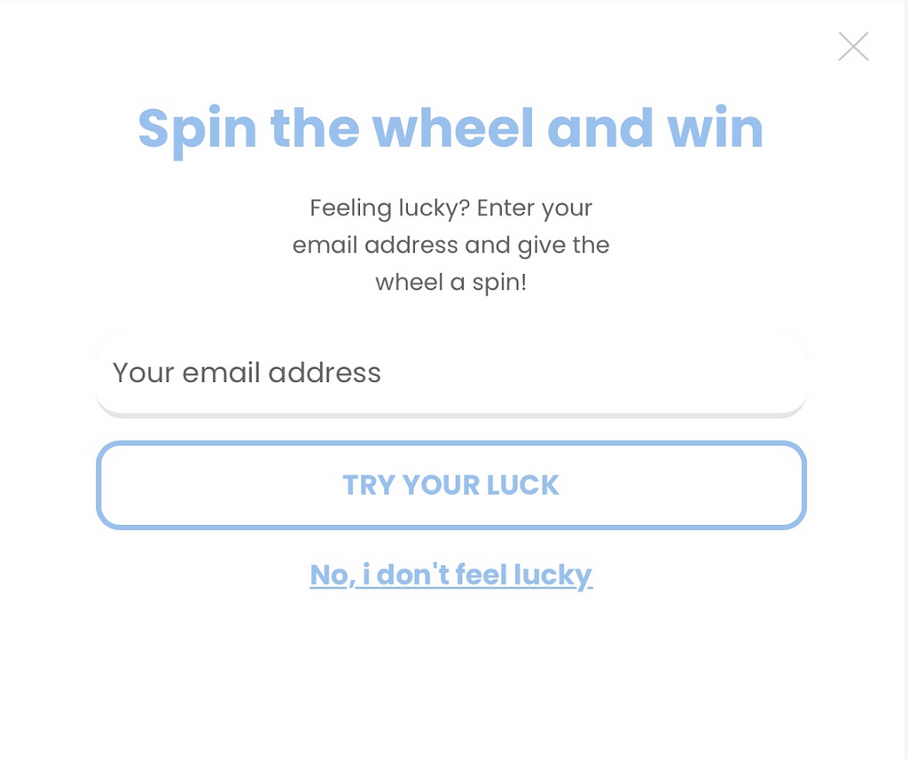 A modal on a website asking users for their email address to win a coupon. The labels used are “Try your luck” if the user wishes to get a coupon code, and “No, I don’t feel lucky” to decline.