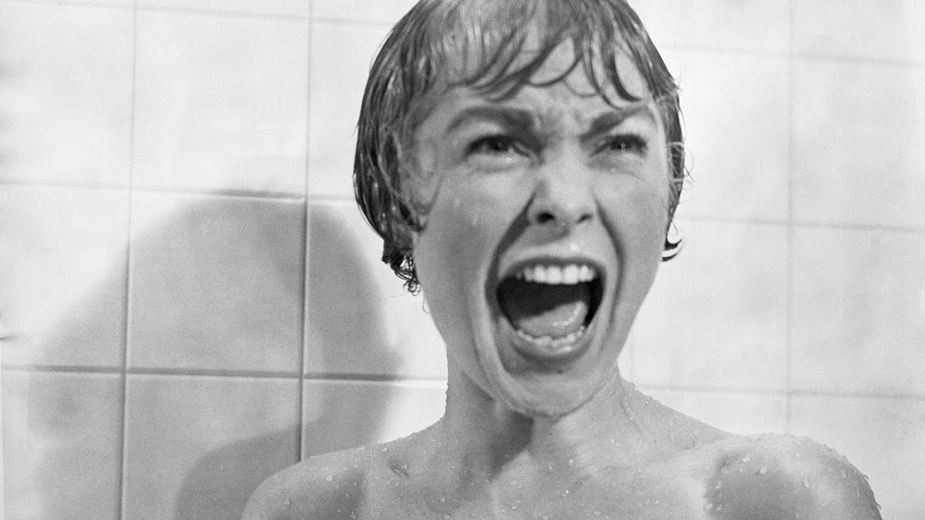 A woman screaming in the shower.