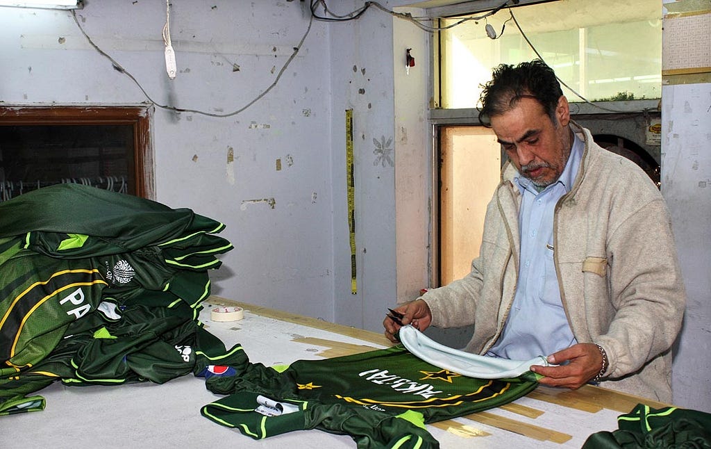 Artisans are busy in preparing the new kit of Pakistani national cricket team for ICC Cricket World Cup