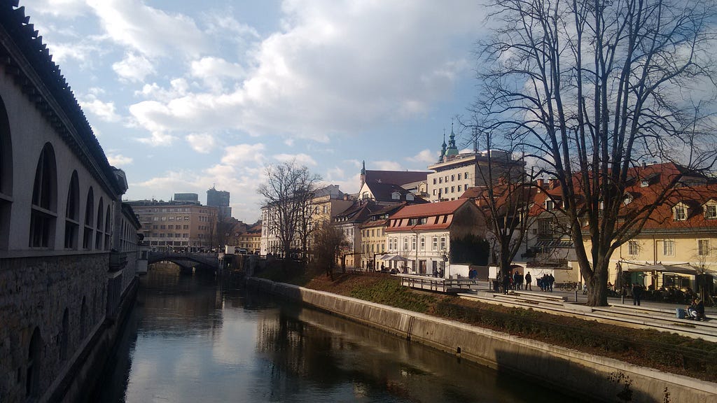 Buildings in Ljubljana next to a canal.