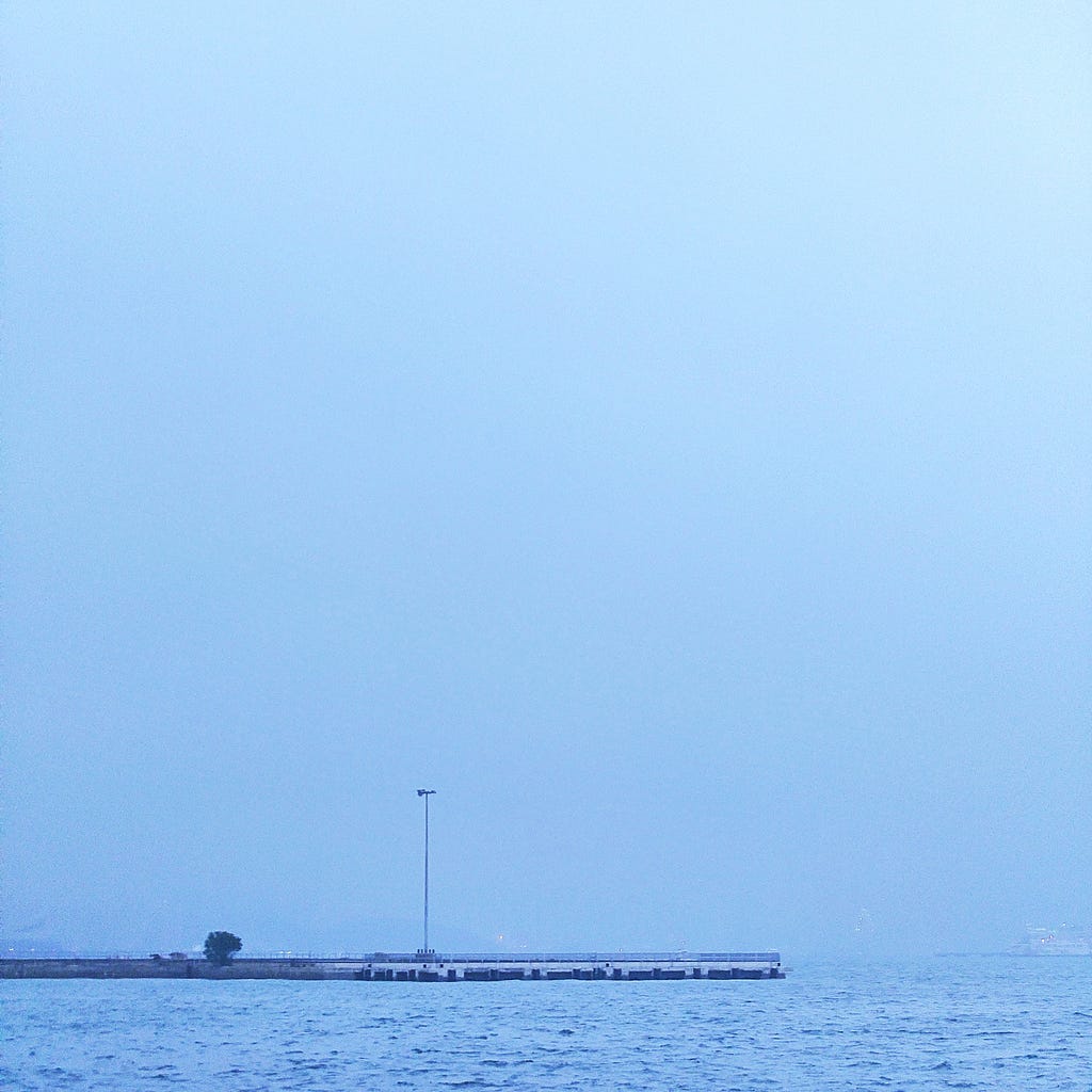 A photograph from afar of what appears to be a sea port.