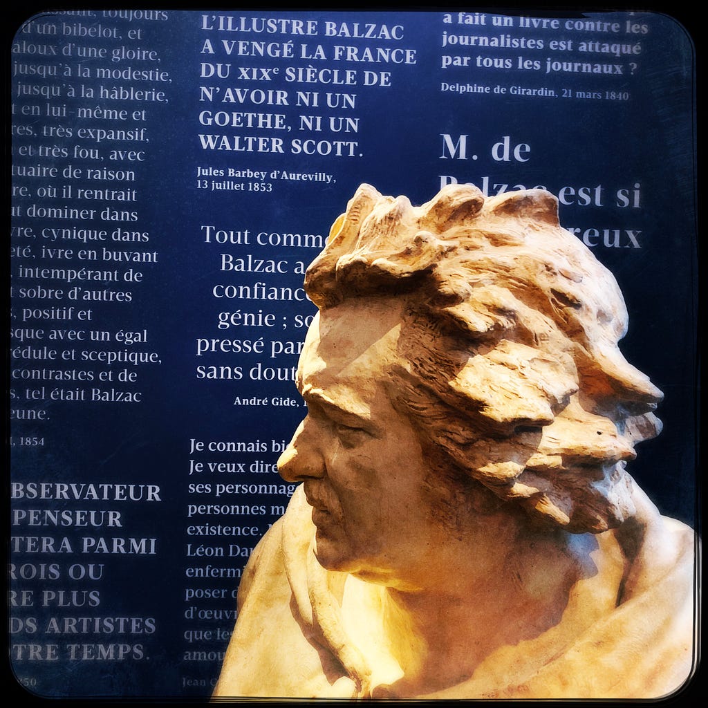 A sculptural bust of the French writer Honoré de Balzac is displayed in the Maison de Balzac museum in Paris, alongside quotes from various authors and other literati about Balzac’s work and legacy.