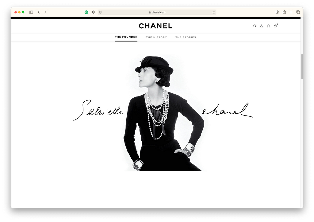 An image of chanel.com showing a black and white photo of Gabrielle Chanel