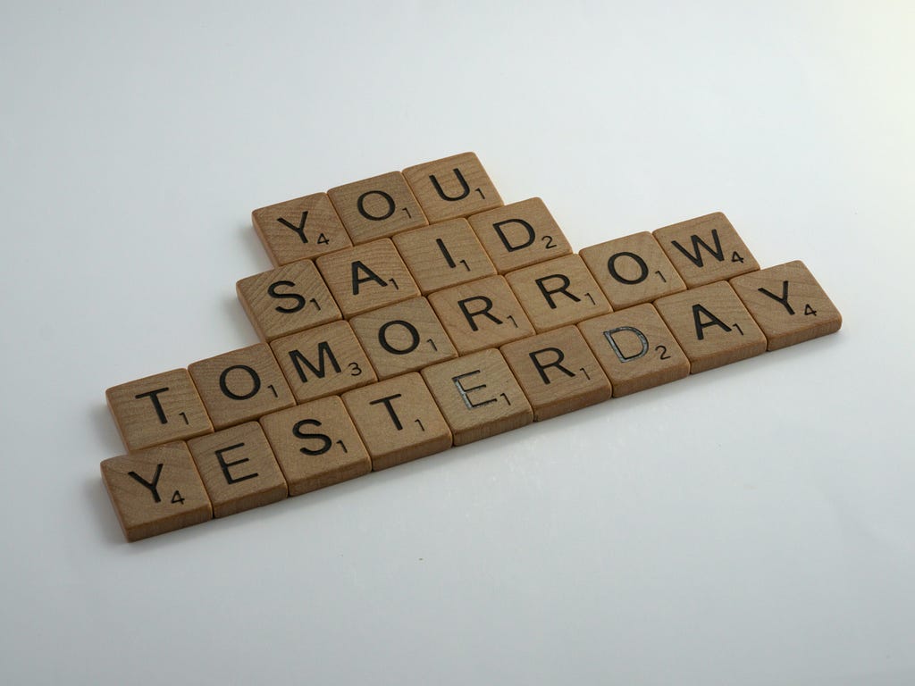 Scrabble pieces that spell “You said tomorrow yesterday”