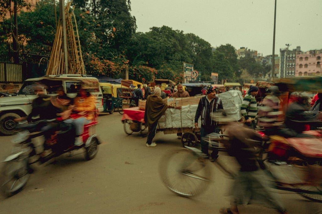 A road in India with fast moving traffic