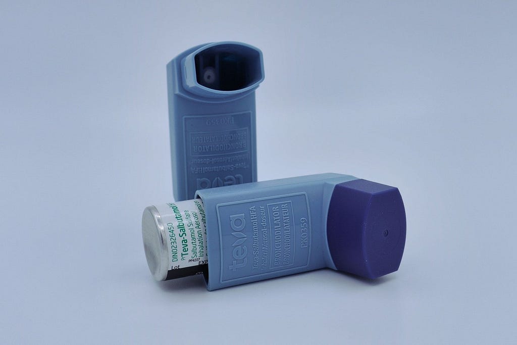 Modern asthma inhalers use plastic housings to protect a metal canister of pressurized gas medicine. This allows for safe and accessible administration of medication.