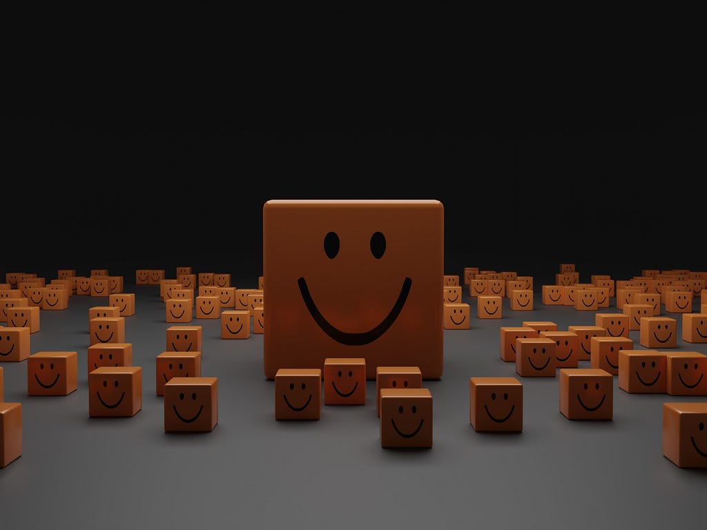 lots of happy cubes sitting on a plane surface