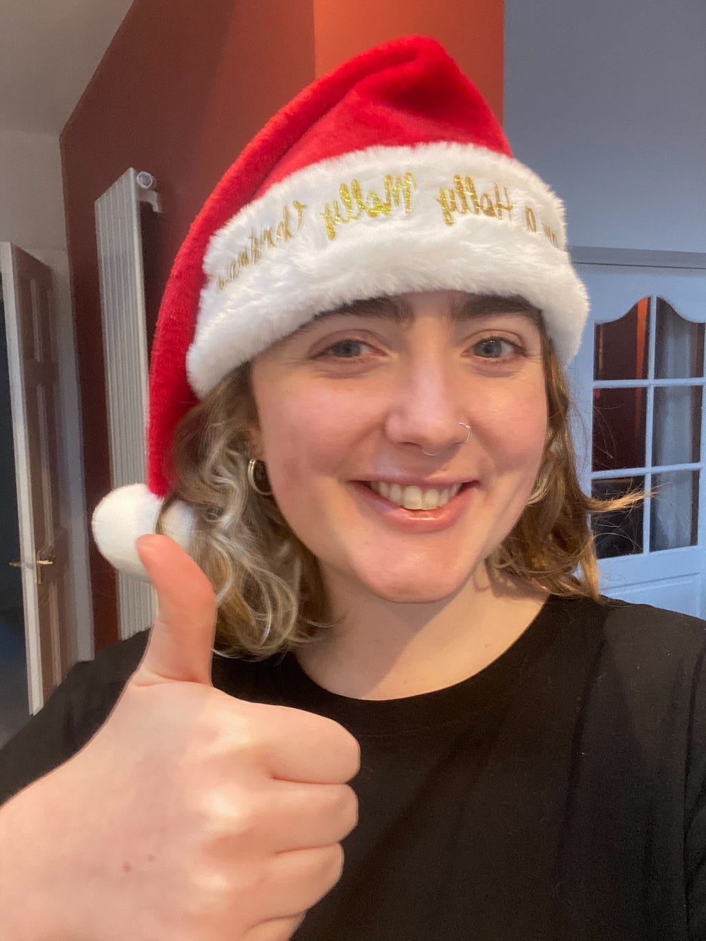 ASOSer Molly wearing her ‘Have a Holly Molly Christmas’ hat