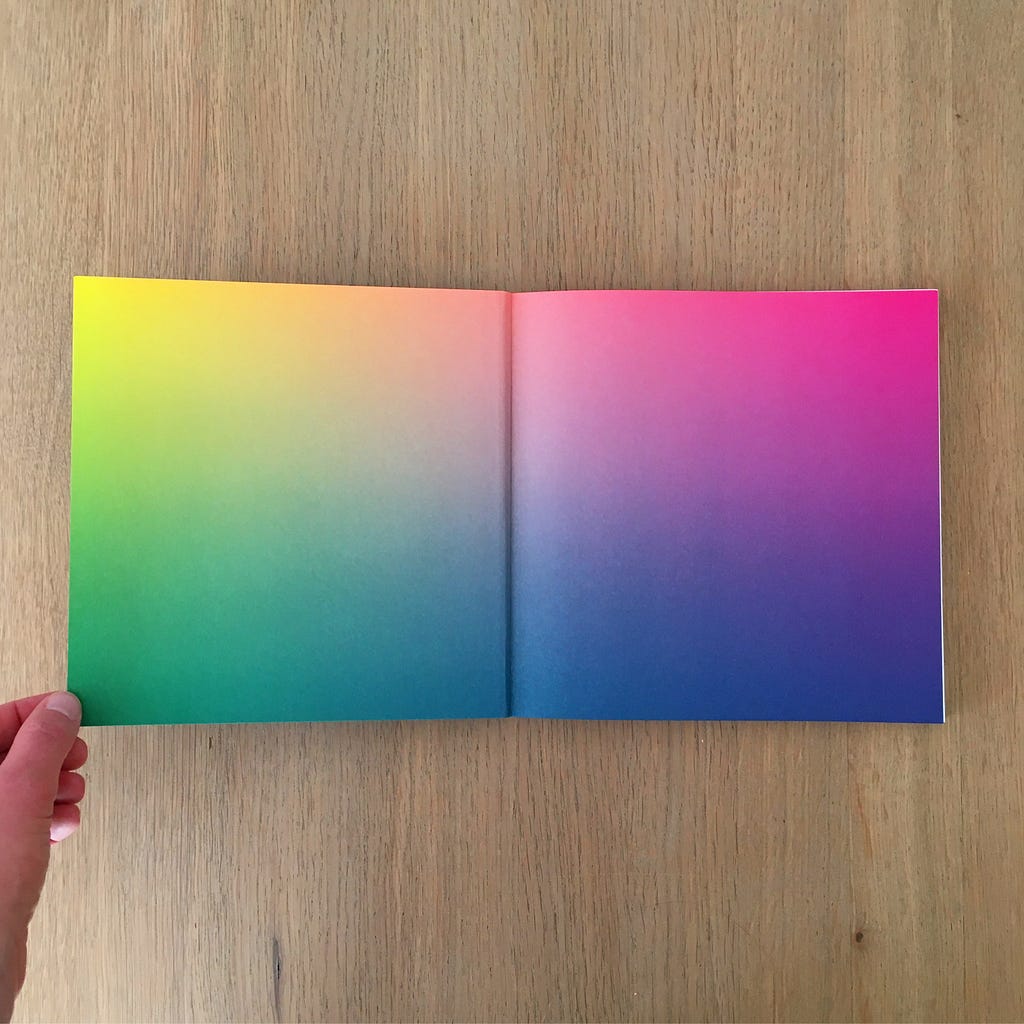Brightly colored gradient endpapers of the book