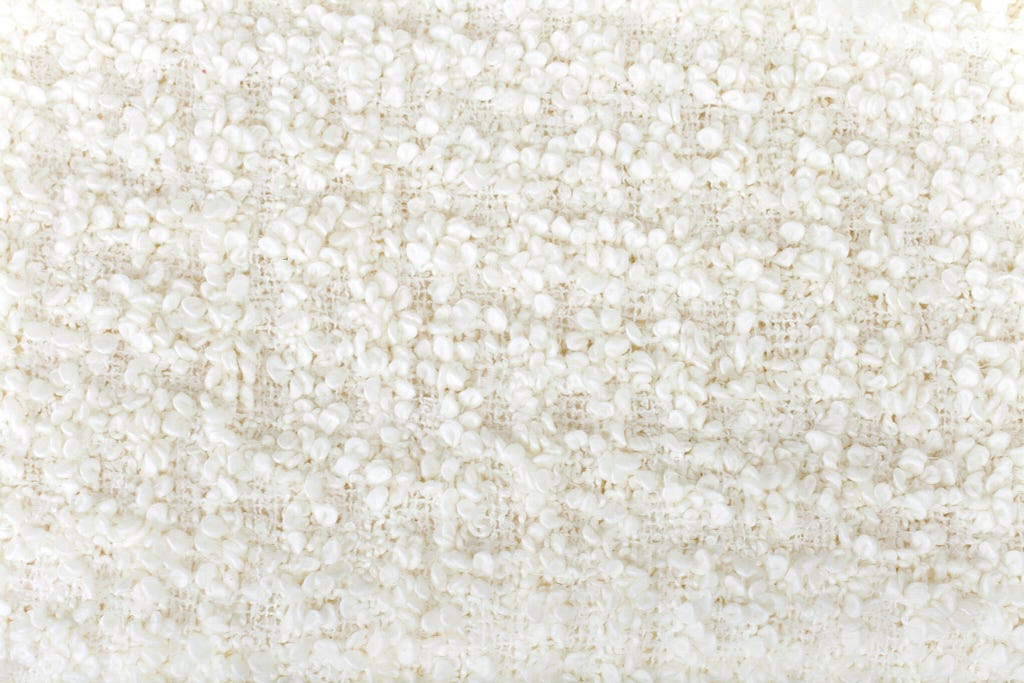 A piece of white boucé fabric