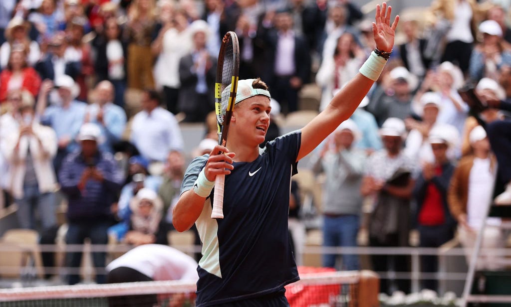 19-year-old debutant Holger Rune on the iconic clay Court Philippe-Chatrier of Roland Garros, where he defeated fourth seed Stefanos Tsitsipas in 2022
