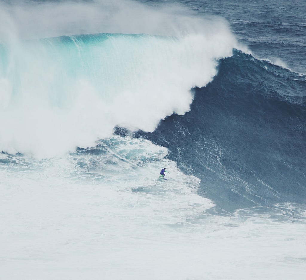 Man surfing a large wave