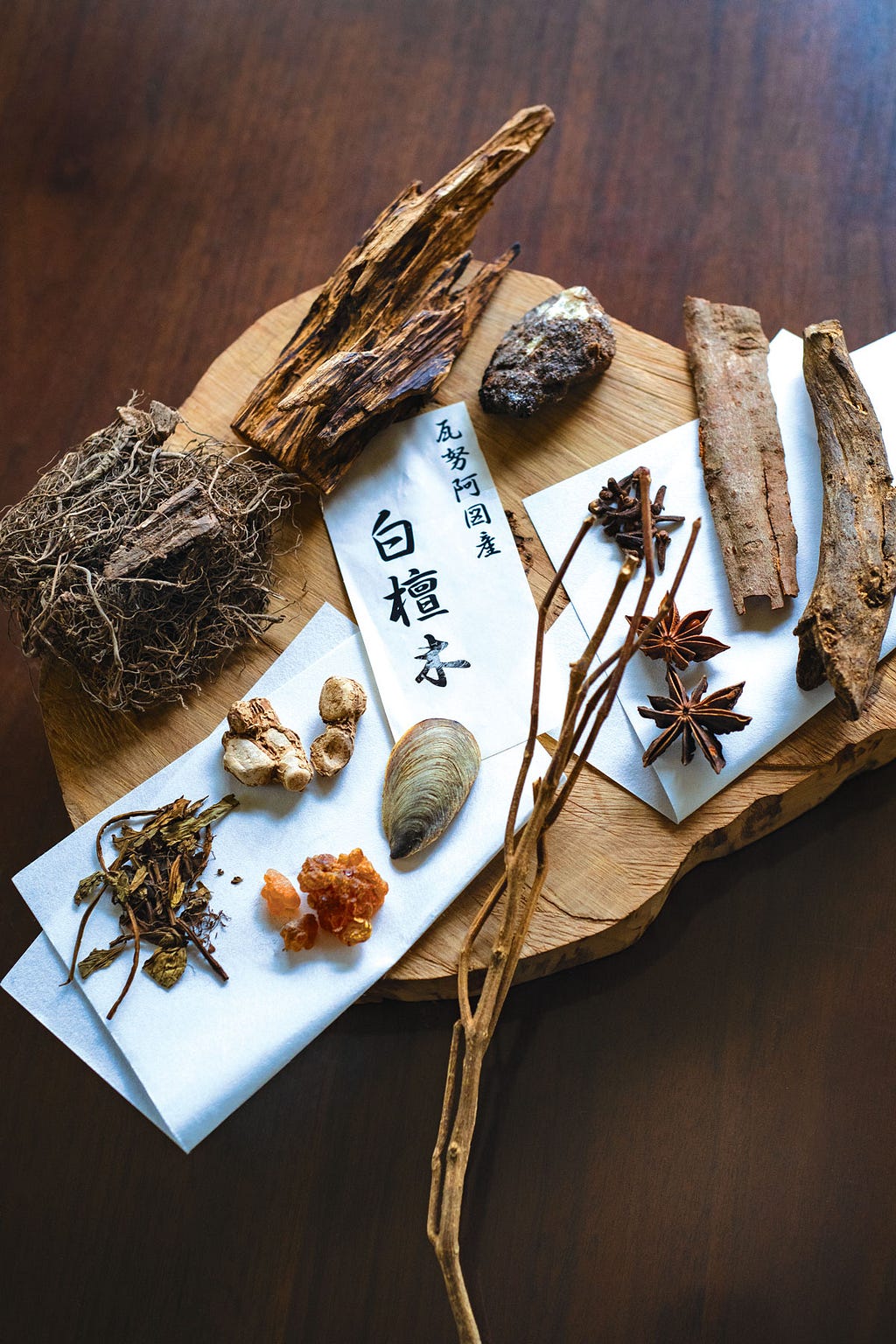 Raw ingredients for making incense: herbs, dried flowers, and bark.