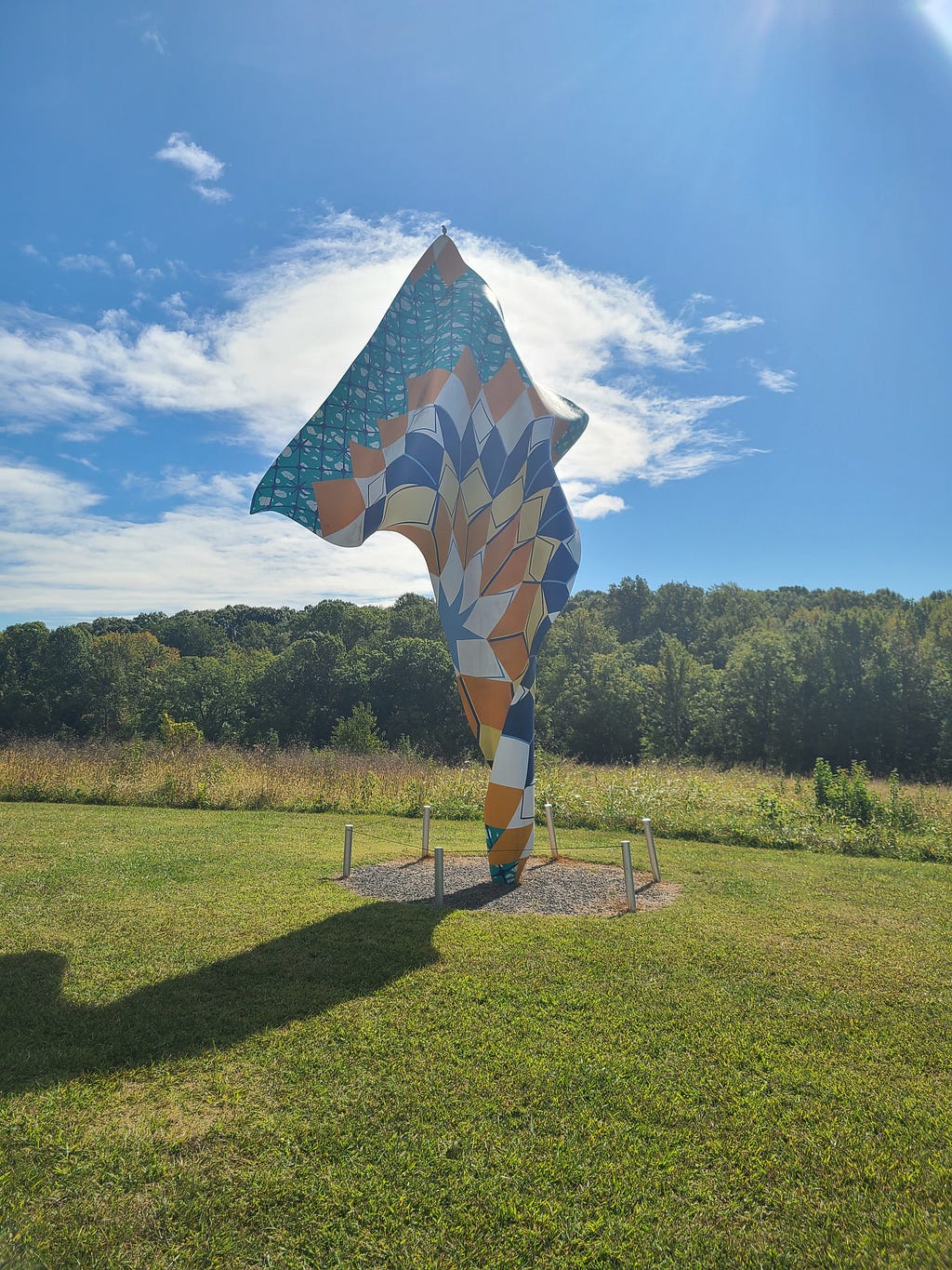 Steel Armature painted with orange, blue, teal patterned fabric