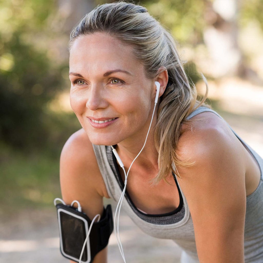 HodgeonRepeat blog — cross-training for women over 40 — woman bending over to rest during workout